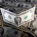 Dollar calm as traders await clues on US rate path